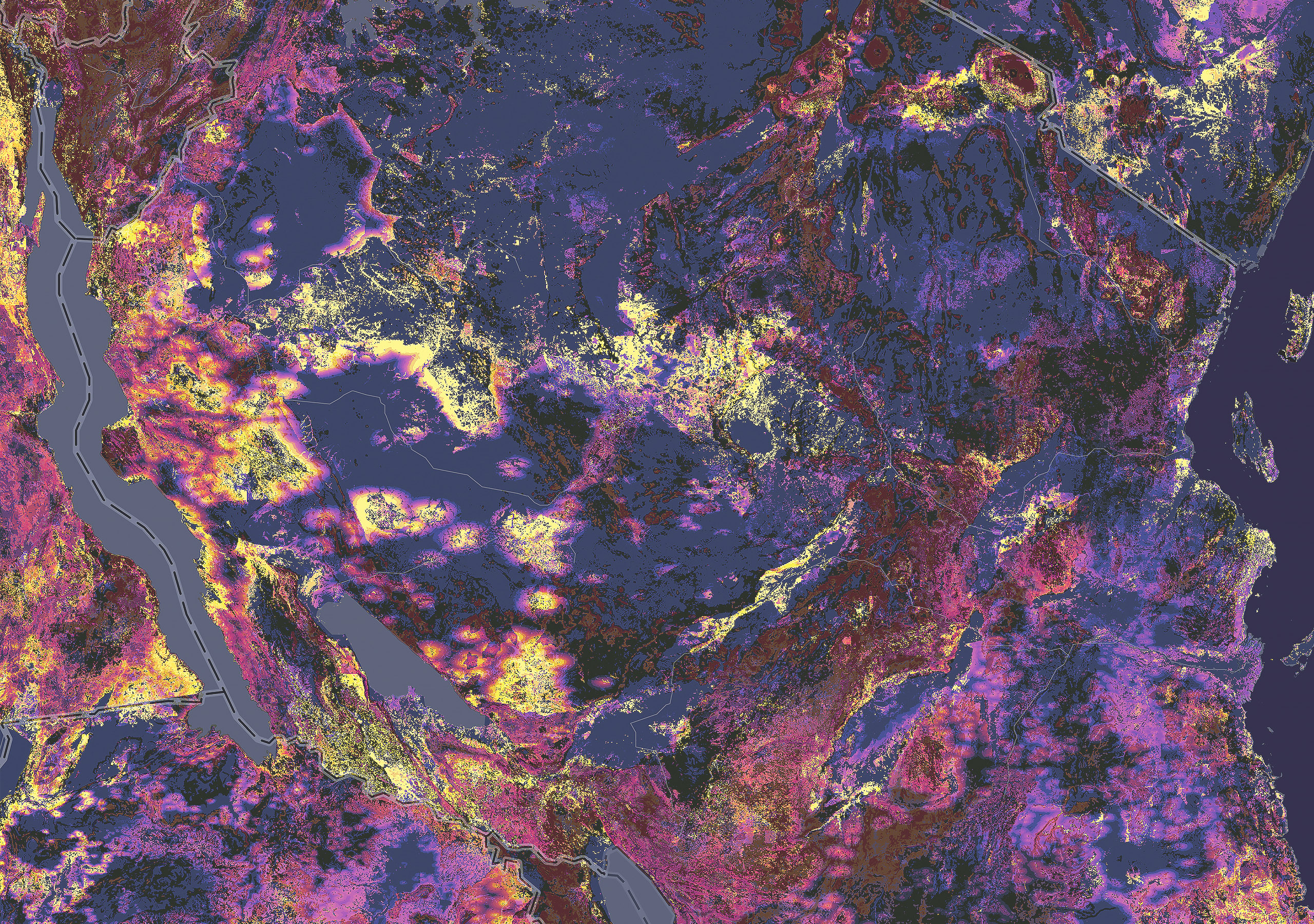 Un mapa de una costa muestra datos de detección remota sobre el terreno cercano en tonos de púrpura, marrón, granate, rosa y amarillo.