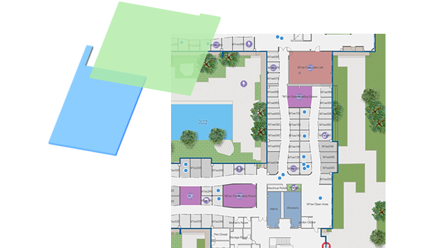 Mapa interior con puntos azules y datos que se gestionan en un SIG para un gran edificio, con formas de colores.