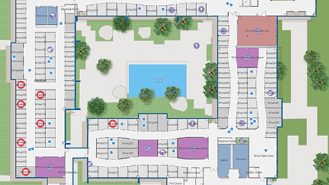 Vista aérea de un edificio digital con plazas, árboles verdes y agua azul que representa una interfaz de gestión de datos en interiores