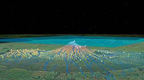 Imagen digital de un terreno en verde, azul y negro con pequeños puntos de datos triangulares