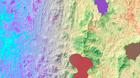 Mapa topográfico multicolor de tierra con colores amarillo, verde y azul
