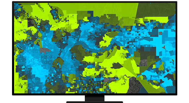 Un gráfico de un monitor de ordenador que muestra un mapa de área en verde y azul intenso sobre un fondo gris