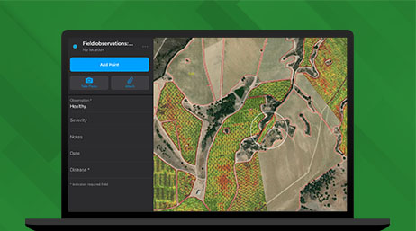 Graphic of a laptop monitor displaying a map dashboard with a heat map of a field alongside a dashboard of data